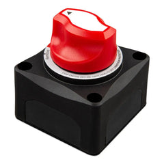 Red and black battery disconnect switch with ON/OFF positions and warning text, mounted on black housing with three bolt